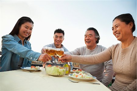 senior couple toasting - Family barbeque party, toast Stock Photo - Premium Royalty-Free, Code: 6116-07086117