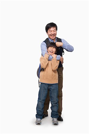 simsearch:6116-07086272,k - Father and son playing Stock Photo - Premium Royalty-Free, Code: 6116-07086260