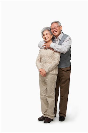 people on white background - Senior couple embracing Stock Photo - Premium Royalty-Free, Code: 6116-07086265