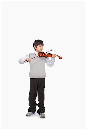 fun people on white background - Boy playing the violin Stock Photo - Premium Royalty-Free, Code: 6116-07086286