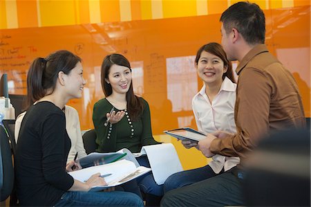 simsearch:6116-09013545,k - Business People Having Meeting in the Office Stock Photo - Premium Royalty-Free, Code: 6116-07086223