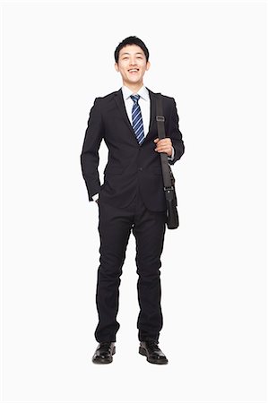 simsearch:6116-07086707,k - Businessman standing with briefcase Stock Photo - Premium Royalty-Free, Code: 6116-07086304