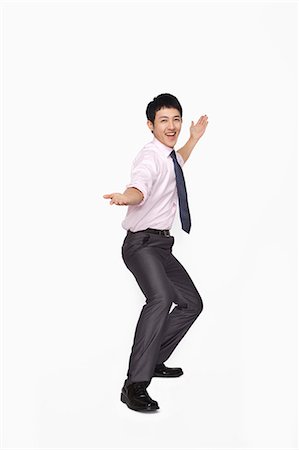 danser - Businessman cheering Photographie de stock - Premium Libres de Droits, Code: 6116-07086335