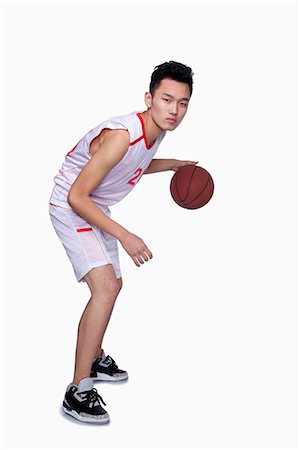 dribbler - Basketball Player Dribbling Photographie de stock - Premium Libres de Droits, Code: 6116-07086461