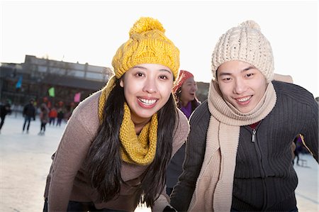 skaten - Young couple at ice rink Photographie de stock - Premium Libres de Droits, Code: 6116-07086585