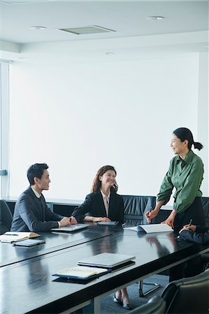 simsearch:6116-07086324,k - Co-workers in meeting room Stock Photo - Premium Royalty-Free, Code: 6116-07086518