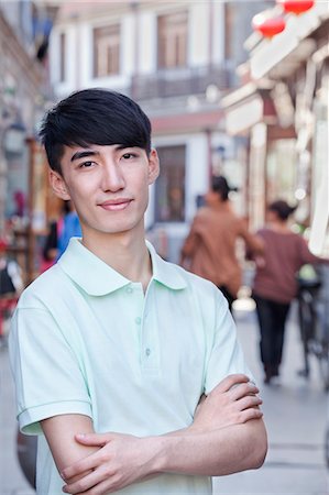 simsearch:6116-07235342,k - Portrait of Young Man Outdoors in Beijing Stockbilder - Premium RF Lizenzfrei, Bildnummer: 6116-07235327