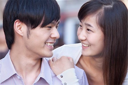 simsearch:6116-07235342,k - Portrait of Young Heterosexual Couple Smiling in Beijing Stockbilder - Premium RF Lizenzfrei, Bildnummer: 6116-07235335