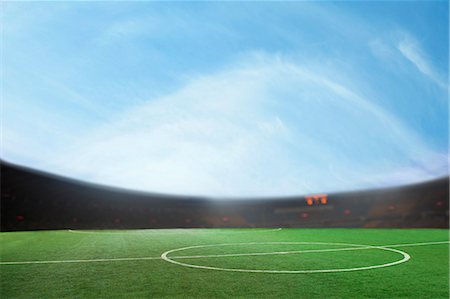 stadium not people - Digital composite of soccer field and blue sky Photographie de stock - Premium Libres de Droits, Code: 6116-07236143