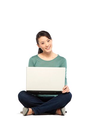 simsearch:649-08145358,k - Young woman using a laptop computer Stockbilder - Premium RF Lizenzfrei, Bildnummer: 6116-08311945
