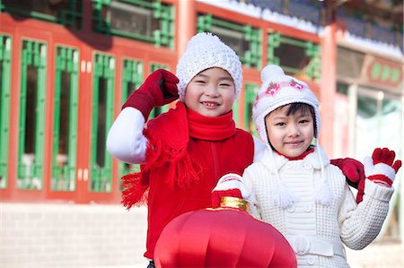 Children holding red lantern Stock Photo - Premium Royalty-Free, Code: 6116-08311913