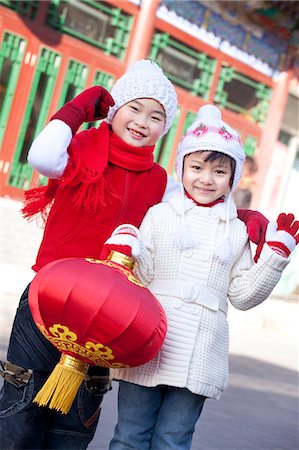 Children holding red lantern Stock Photo - Premium Royalty-Free, Code: 6116-08311912