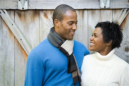 simsearch:614-02680569,k - Couple smiling at each other Stock Photo - Premium Royalty-Free, Code: 6116-08945544