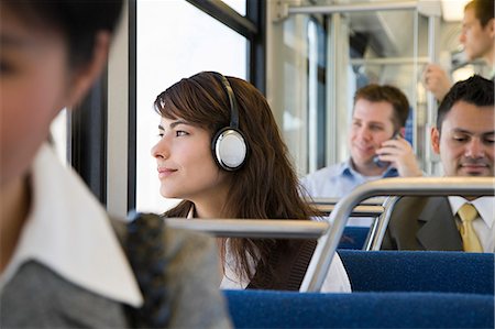 elegant asian woman reading - Commuters on train Stock Photo - Premium Royalty-Free, Code: 6116-08945626