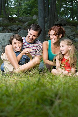 father son camping woods - Happy family in forest Stock Photo - Premium Royalty-Free, Code: 6116-08945750