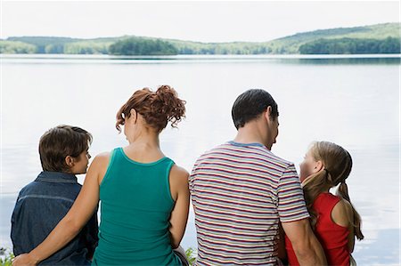 father son camping woods - Family sitting by lake Stock Photo - Premium Royalty-Free, Code: 6116-08945761