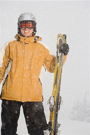 ski yellow - Portrait of a skier Stock Photo - Premium Royalty-Free, Code: 6116-08915318