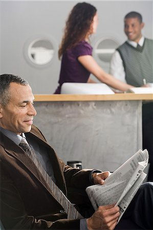 reception relaxed smile - People in an office Stock Photo - Premium Royalty-Free, Code: 6116-09013477