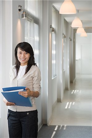 Female office worker Photographie de stock - Premium Libres de Droits, Code: 6116-09013528