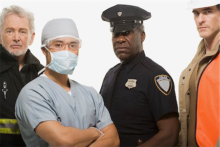 policeman fireman - Firefighter surgeon police officer and construction worker Stock Photo - Premium Royalty-Free, Code: 6116-09013760