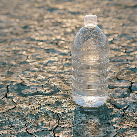 The Landscape Of The Black Rock Desert In Nevada. A Bottle Of Water. Filtered Mineral Water. Stock Photo - Premium Royalty-Free, Code: 6118-07122051