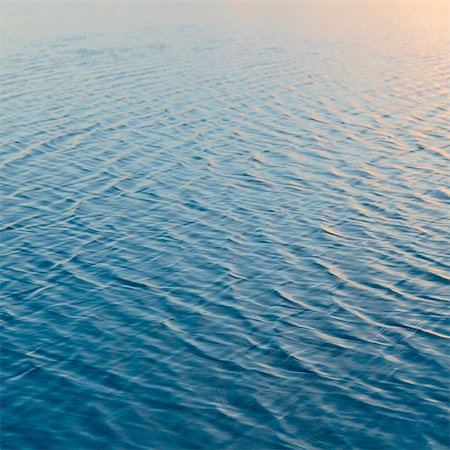 Shallow Water Over The Surface At The Bonneville Salt Flats Near Wendover. Ripples. Stock Photo - Premium Royalty-Free, Code: 6118-07122074