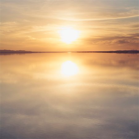Shallow Water Over The Surface At The Bonneville Salt Flats, At Sunset. Stock Photo - Premium Royalty-Free, Code: 6118-07122075