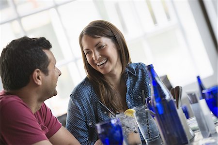 restaurant in us - A cafe interior. A couple seated at a table. Stock Photo - Premium Royalty-Free, Code: 6118-07235077