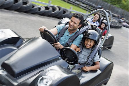 simsearch:6118-07351170,k - Boys and men go-karting on a track. Stock Photo - Premium Royalty-Free, Code: 6118-07235148