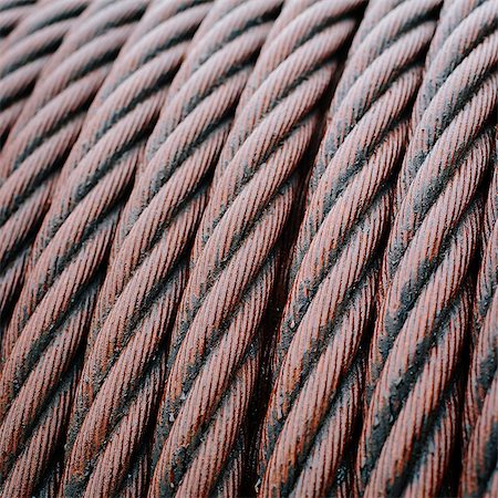 electricity equipment - Close up of industrial steel hawsers stored neatly. Stock Photo - Premium Royalty-Free, Code: 6118-07351320