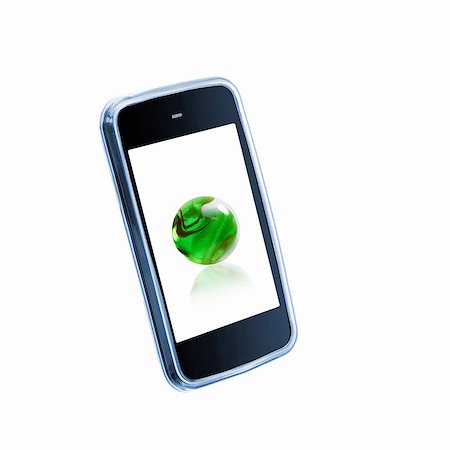 A small handheld communication device or phone with a green globe or sphere on the screen. Stock Photo - Premium Royalty-Free, Code: 6118-07351727