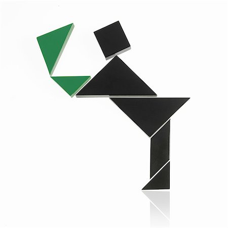 shape - A number of triangles, squares and shapes arranged to represent a human being, in motion or action. Stock Photo - Premium Royalty-Free, Code: 6118-07351725