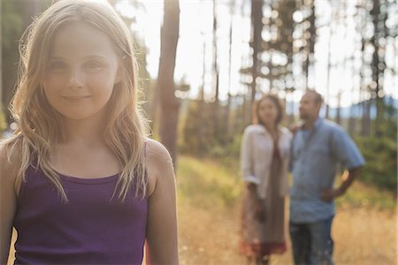 simsearch:6118-07352114,k - A young girl with long blonde hair in woodland in the fresh air. Foto de stock - Sin royalties Premium, Código: 6118-07352092