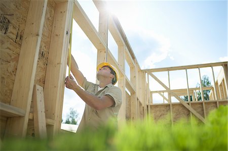 A construction site, a domestic house being built in a rural setting in New York State, USA Photographie de stock - Premium Libres de Droits, Code: 6118-07352214