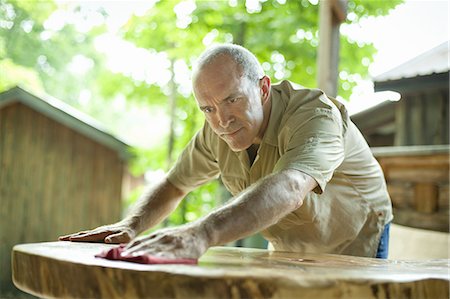 single mature adult - A construction site, a domestic house being built in a rural setting in New York State, USA Stock Photo - Premium Royalty-Free, Code: 6118-07352368