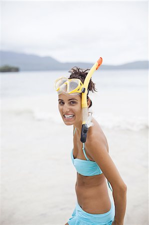 simsearch:6118-07352408,k - A young woman wearing snorkelling gear on the Samana Peninsula in the Dominican Republic. Stock Photo - Premium Royalty-Free, Code: 6118-07352404