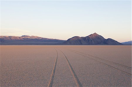 Tyre marks and tracks in the playa salt pan surface of Black Rock Desert, Nevada. Stock Photo - Premium Royalty-Free, Code: 6118-07352767