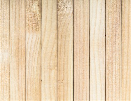 simsearch:6118-07351984,k - Stack of sawn prepared timber, spruce wood planks or studs, for use. Treated planed wood in traditional 2 by 4 measured cut shapes. Photographie de stock - Premium Libres de Droits, Code: 6118-07353282