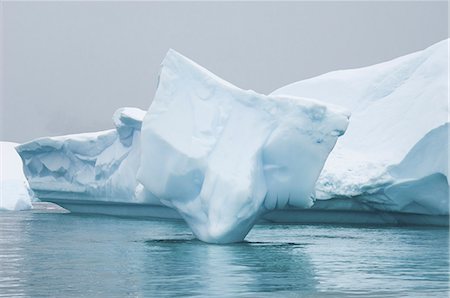 Iceberg along the Antarctic Peninsula. Stock Photo - Premium Royalty-Free, Code: 6118-07353660
