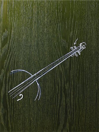 simsearch:6118-07352659,k - A line drawing image on a natural wood grain background. The neck and strings of a woodwind musical instrument. Stock Photo - Premium Royalty-Free, Code: 6118-07353996