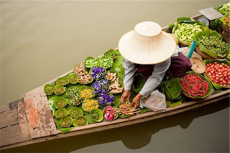 floating market - Floating markets are a common tradition throughout Southeast Asia. Bangkok, Thailand. Stock Photo - Premium Royalty-Free, Code: 6118-07440129