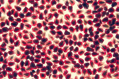 Organic pomegranate seeds Foto de stock - Sin royalties Premium, Código: 6118-07440557