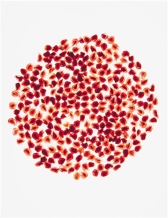 studio fruit - Organic pomegranate seeds Stock Photo - Premium Royalty-Free, Code: 6118-07440556