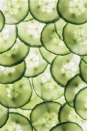 Organic cucumber slices Stock Photo - Premium Royalty-Free, Code: 6118-07440564