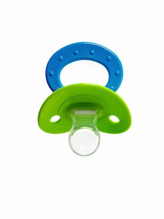 dummy pacifier - A coloured plastic baby pacifier, dummy or soother. Stock Photo - Premium Royalty-Free, Code: 6118-07440590