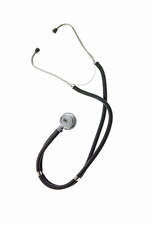 A doctor's stethoscope, a diagnostic instrument for assessment of health. Black tubing. Ear pieces, and a chest piece. Stock Photo - Premium Royalty-Free, Code: 6118-07440760