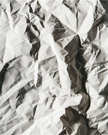 simsearch:6118-07351309,k - A piece of recycled white paper, crumpled and scrunched up, refuse. Photographie de stock - Premium Libres de Droits, Code: 6118-07440727