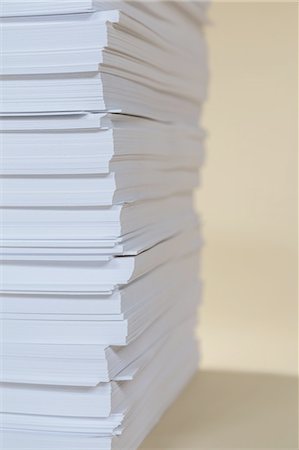 stacking - A stack of recycled white paper, paper supplies. Stock Photo - Premium Royalty-Free, Code: 6118-07440724