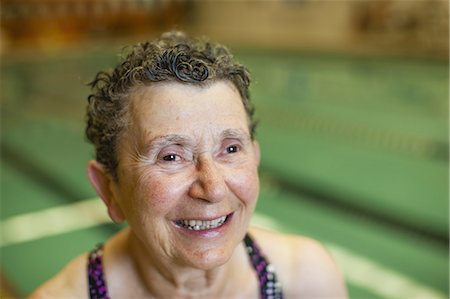 senior citizen bathing suit - An elderly woman in a swimming pool, taking exercise. Stock Photo - Premium Royalty-Free, Code: 6118-07521792
