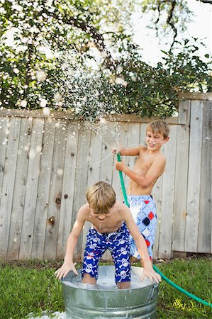 swim shorts for boys - Austin, Texas, USA Stock Photo - Premium Royalty-Free, Code: 6118-07913340